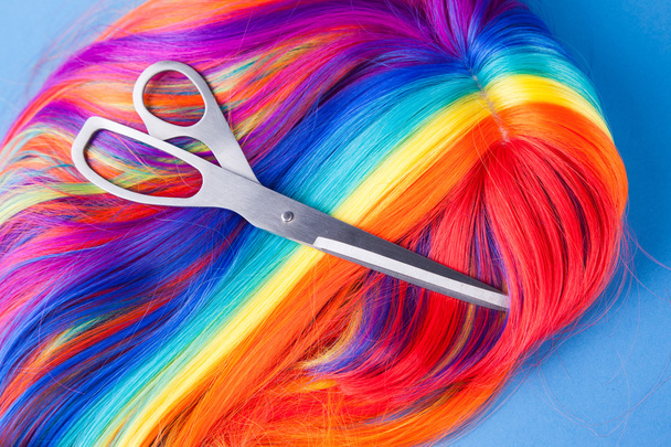 Scissors with colorful wig - Fotoğraf, Görsel