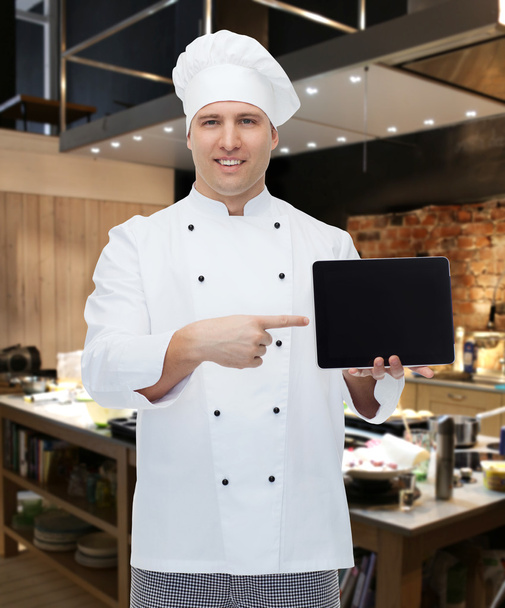 happy male chef cook showing with tablet pc - Foto, Bild