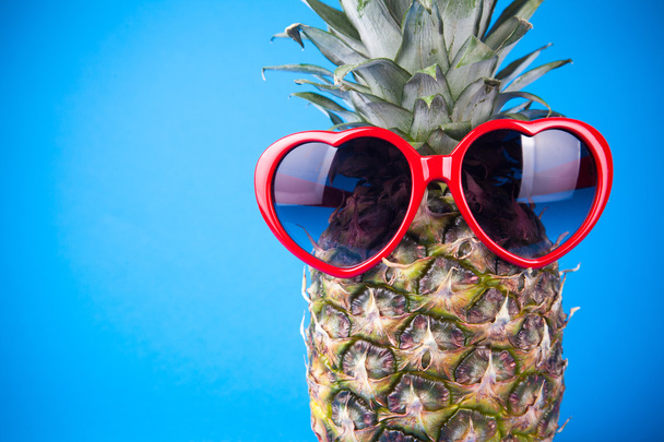 Funny pineapple in a sunglasses - Фото, зображення