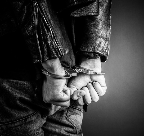 Man hands in handcuffs - Foto, Bild