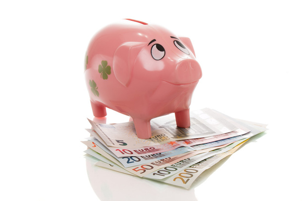 Pinkfarbenes Geldschwein mit Euro - Foto, Bild