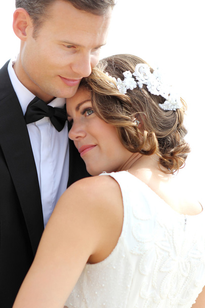 bride and groom embrace each other - Fotografie, Obrázek