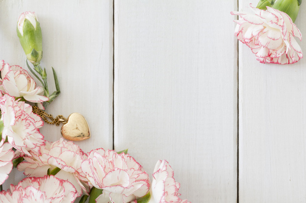 Carnations with Heart Locket from Above - Φωτογραφία, εικόνα
