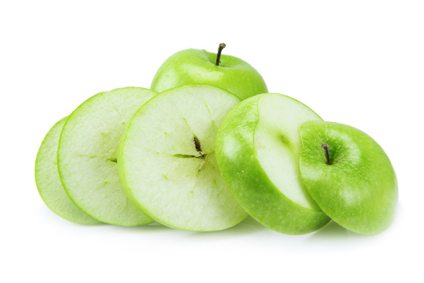 Manzana verde en rodajas aislada sobre un fondo blanco
. - Foto, imagen
