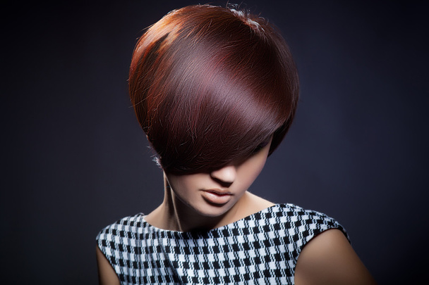 Beautiful woman portrait with fashion haircut and creative trendy make-up - 写真・画像