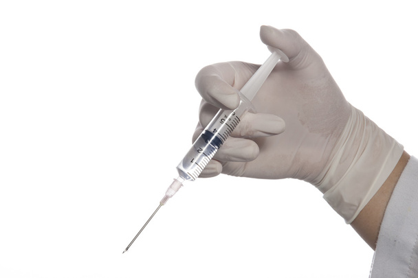Hand holding syringe - Zdjęcie, obraz