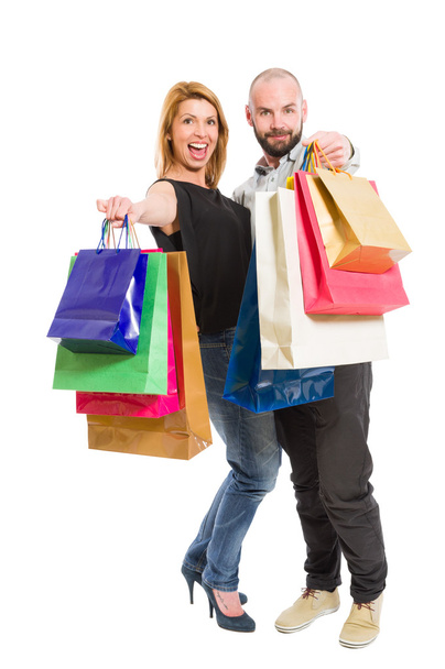 Excited and enthusiastic young shopping couple - Foto, Imagen
