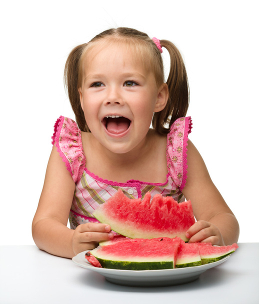 Cute little girl is going to eat watermelon - Фото, зображення