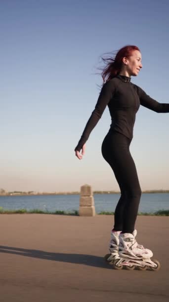 Happy Slim Woman with Beautiful Figure Rollerblading on Asphalt in City Park, Enjoying Hobby and Feeling Free and Energetic. Active Recreation Concept. Vertical Video, Slow Motion - Footage, Video