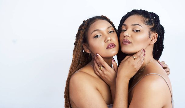 Lesbian, makeup and portrait of women in studio for cosmetics, support and beauty on white background. Serious, couple and mockup with pride in lgbtq for dermatology, love and solidarity together. - Photo, Image