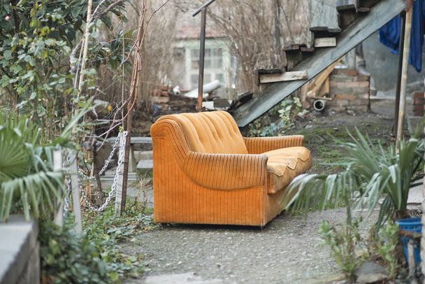 Old sofa in a courtyard, Tbilisi, Georgia country. - Photo, Image