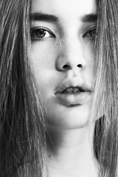 Gorgeous closeup girl portrait with freckles black and white - 写真・画像