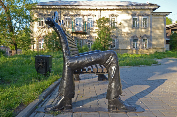 Unusual bench with legs in shoes, hands and eyes. Irkutsk - Photo, Image