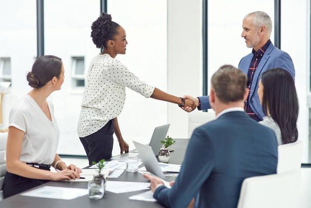 Business, people and handshake with hands in office, partnership and group collaboration or b2b contrac. Teamwork, greeting or congratulations or welcome, thank you gesture for onboarding or merger. - Photo, Image