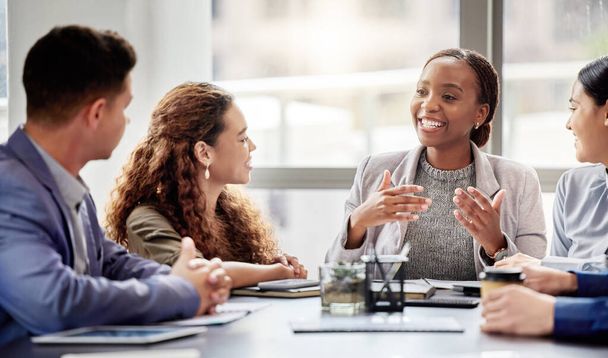 Discussion, meeting and business people in office for teamwork, planning or review at table. Collaboration, professional and group of diverse employees for ideas, conversation or project development. - Photo, Image