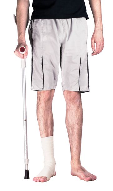Man with crutch - Photo, Image