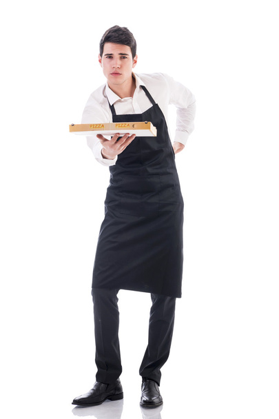 Attractive young chef or waiter holding pizza box - Foto, imagen