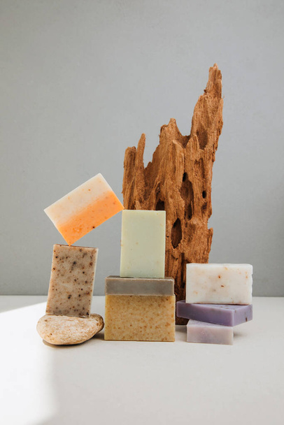 Handmade soap from natural ingredients, various herbs. Concept of sustainable use, bath products. Front view - Photo, Image