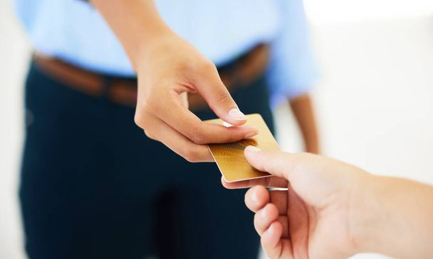 Hands, sale and customer with credit card for shopping, payment and commerce for product at store, mall and boutique. Person, cashier and service for banking, retail and financial transaction. - Photo, Image