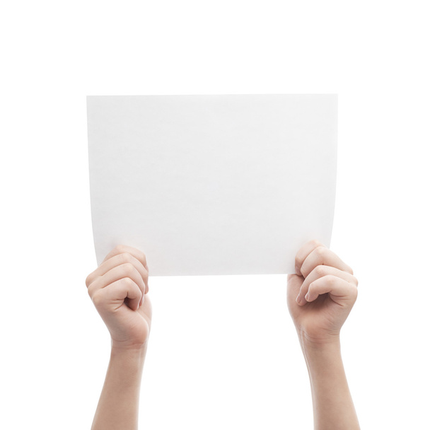Two hands holding A4 sheet of paper - Foto, immagini