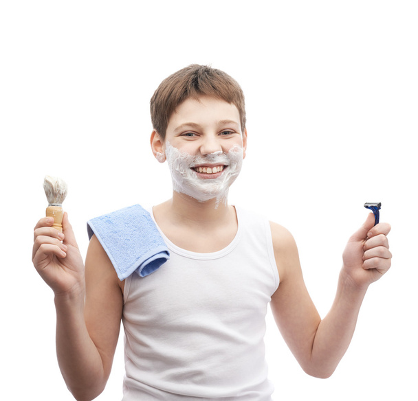 Young boy in process of shaving - Foto, Bild