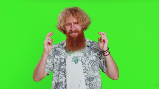 Sad bearded man feeling hopelessness loneliness, nervous breakdown, loses becoming surprised by lottery results, bad fortune, loss unlucky news. Attractive young guy isolated on chroma key background - Footage, Video