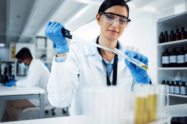 Woman, vial liquid or scientist in lab for medical innovation, life expectancy and antiaging medicine. Future, test and healthcare biologist with chemistry tube in research or science examination. - Photo, Image