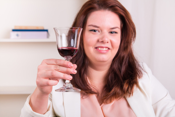Elegant woman drinking wine - Фото, изображение