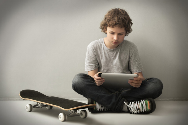 teenager with tablet pc - 写真・画像