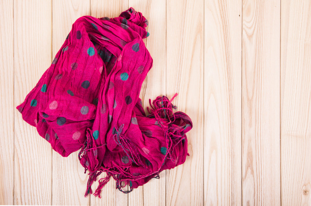 red scarf on wooden background - Photo, Image
