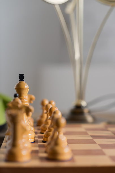 Chess pieces on board - Foto, Bild