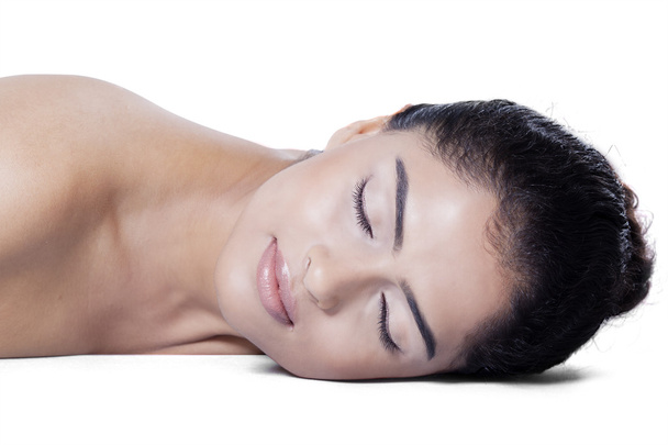 Woman lying down after skincare - Foto, Bild