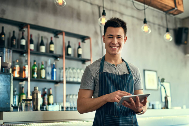 Man, tablet and barista portrait in pub, typing and waiter for online review or report and inventory order for business. Communication, planning and information search, sales and contact suppliers. - Photo, Image