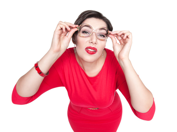 Plus size woman in glasses fixedly looking on you isolated. Top  - Photo, Image