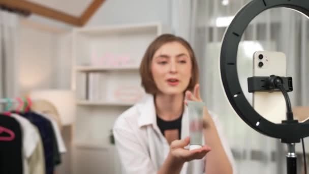 Woman influencer shoot live streaming vlog video review skincare for prim social media or blog. Happy young girl with cosmetics studio lighting for marketing recording session broadcasting online. - Footage, Video