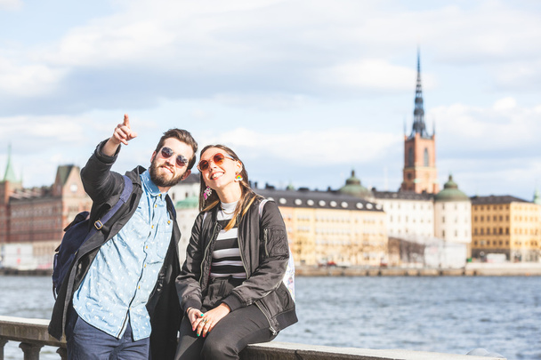 Young hipster couple visiting Stockholm - Фото, зображення