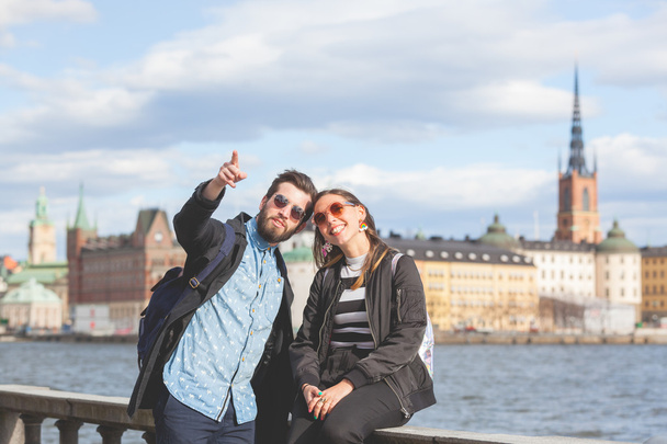 Young hipster couple visiting Stockholm - Φωτογραφία, εικόνα