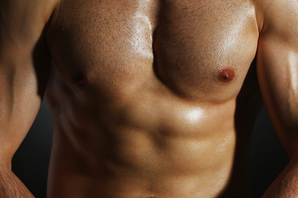 Muscle young man close up - Foto, Bild