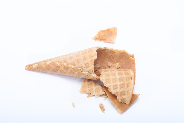 Crashed cone for ice cream isolated on a light background - Photo, Image
