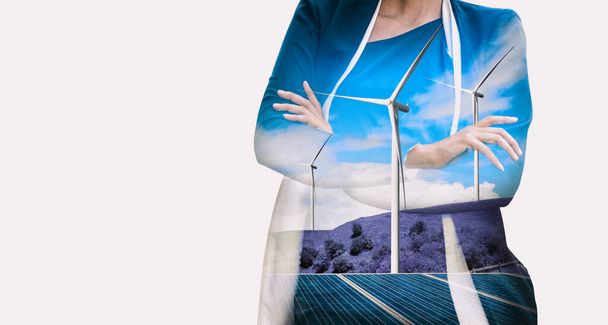 Double exposure graphic of business people working over wind turbine farm and green renewable energy worker interface. Concept of sustainability development by alternative energy. uds - Photo, Image