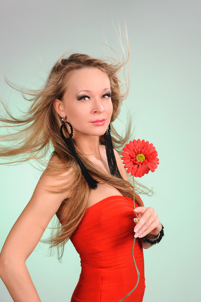 girl with red flower - Fotó, kép