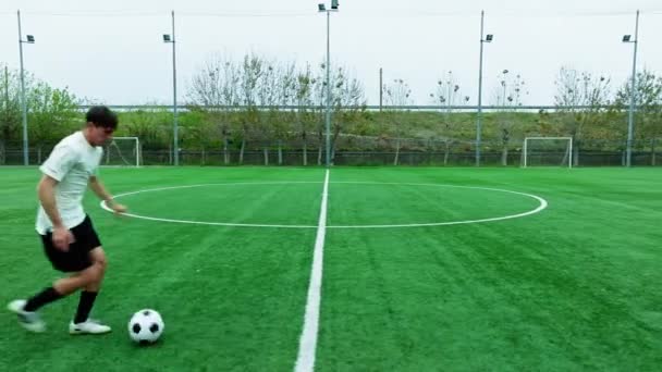 Teenage Footballer Runs Alone In The Field. - Footage, Video