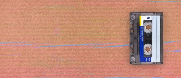 Прапор ретро-касетної стрічки на абстрактній текстурованій поверхні паперу. - Фото, зображення