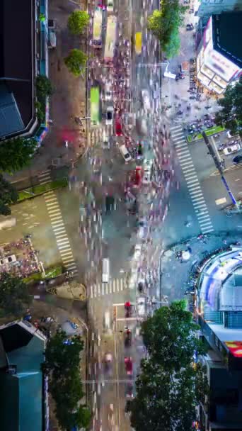 Cronologia aerea del traffico serale ad un incrocio a Ho Chi Minh City, Vietnam. - Filmati, video