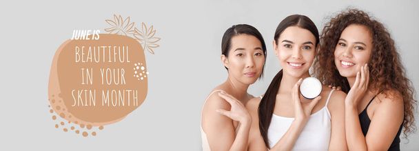 Banner for Beautiful In Your Skin Month with young women with cosmetic cream - 写真・画像