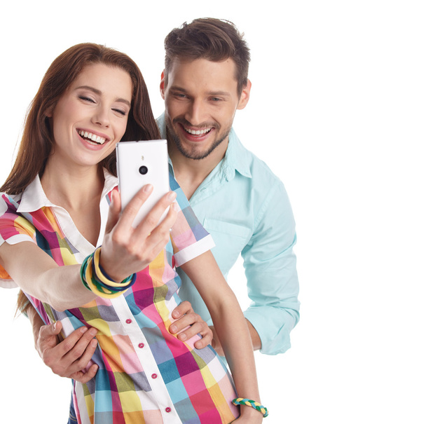 Happy hipster couple taking a selfie - Photo, image