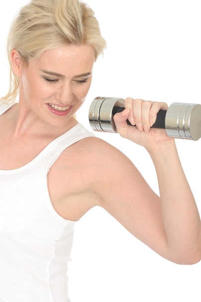 Atractiva sexy ajuste saludable joven mujer haciendo ejercicio con pesas
 - Foto, Imagen