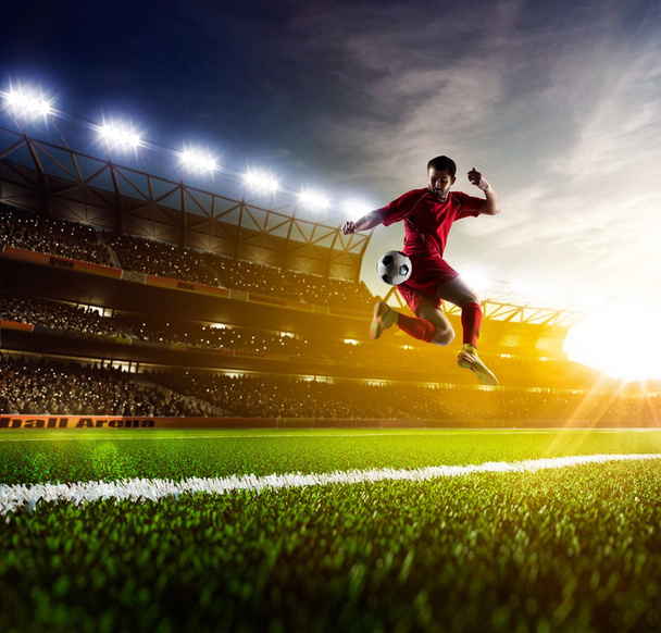 Soccer player in action - 写真・画像