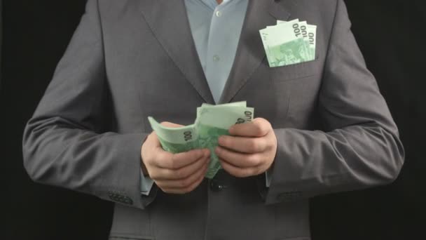 Manos masculinas contando euros. Dinero, riqueza, inversión, negocios
 - Imágenes, Vídeo