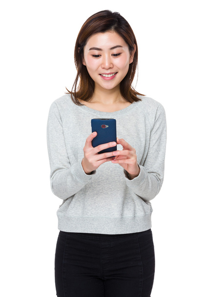 Asian woman using cellphone - Photo, Image